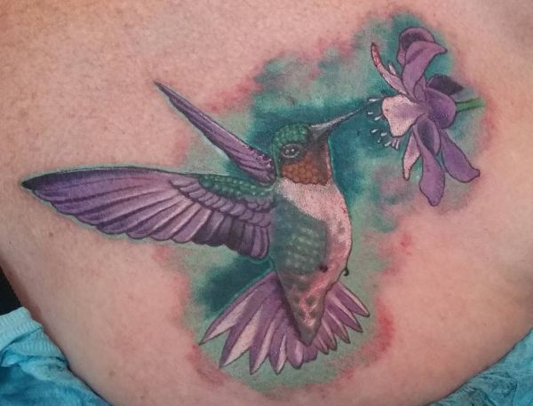 Kolibri mit Blüte Tattoo Seiten