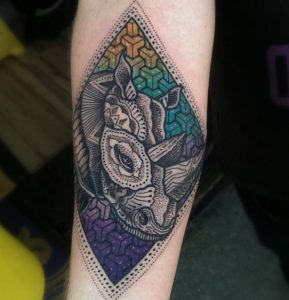 Mandala Nashorn Tattoo Design auf dem Arm