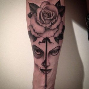 Rose und la catrina Design auf dem Arm