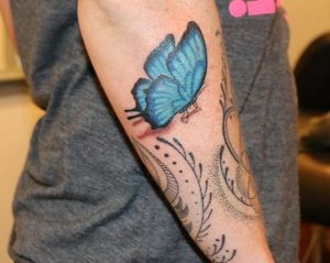 Ulysses Schmetterling Tattoo am Unterarm